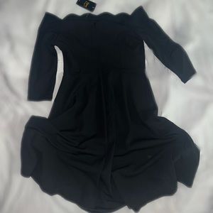 MISSMAY new with tag black dress (below the knee) has a zipper in the back